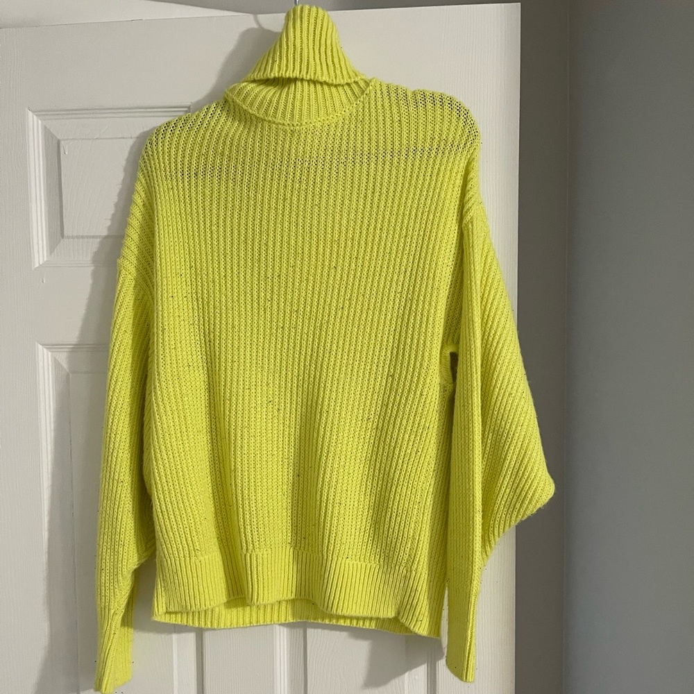 Bright yellow sweater